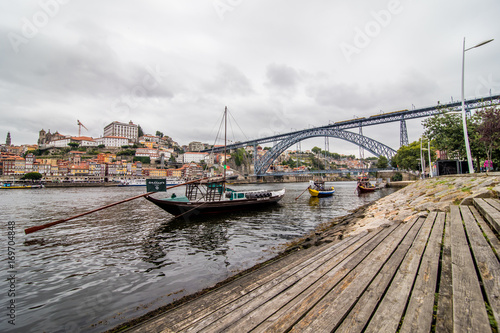 Porto, Portugal - July 2017. View of the iconic Dom Luis I bridge crossing the Douro River, and the historical Ribeira and Se District in the city of Porto, Portugal. Unesco World Heritage Site. © F8  \ Suport Ukraine