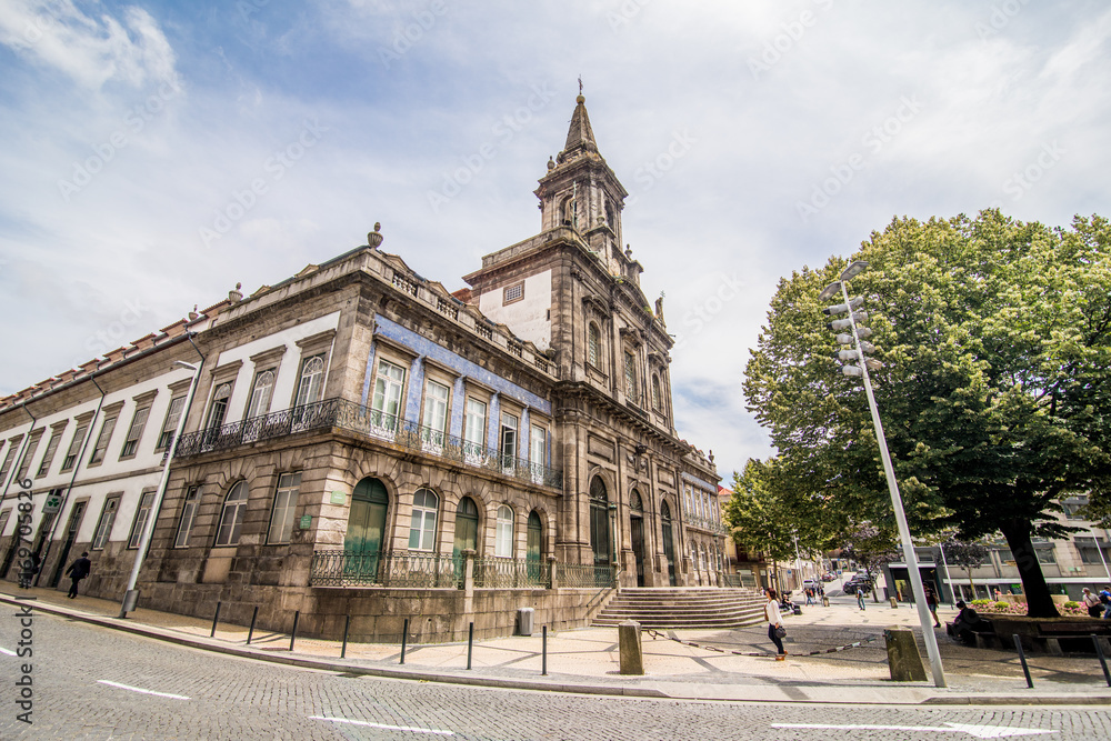 Porto, Portugal - July 2017. Two portuguese churches in Porto that look like just one big church are actually connected. To the left is Carmelitas Church and to the right is Carmo Church.