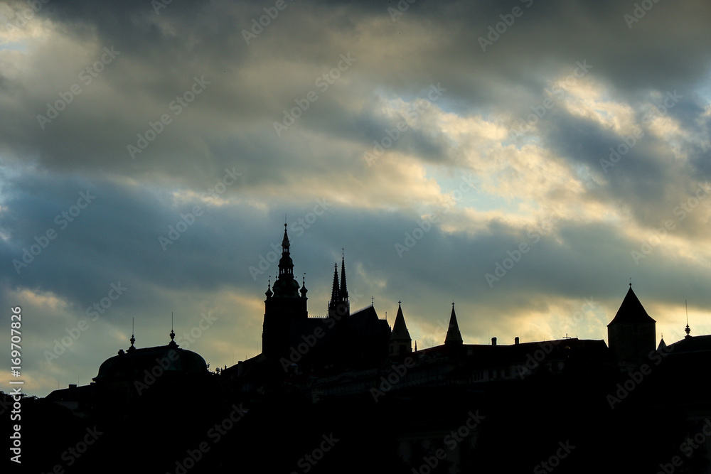 Prague castle at sunset with menacing skies