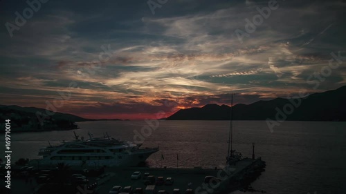 Beautiful colored sunset and luxury yacht in the sea, Croatia photo