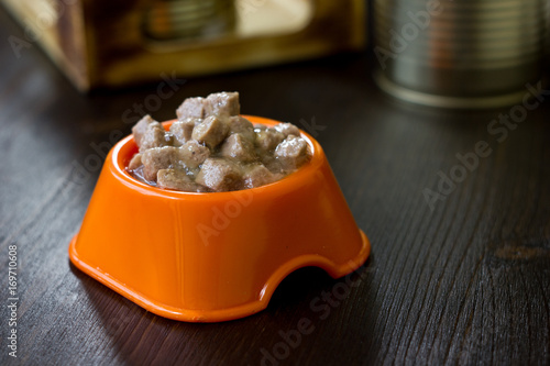 Canned pet food in a orange...