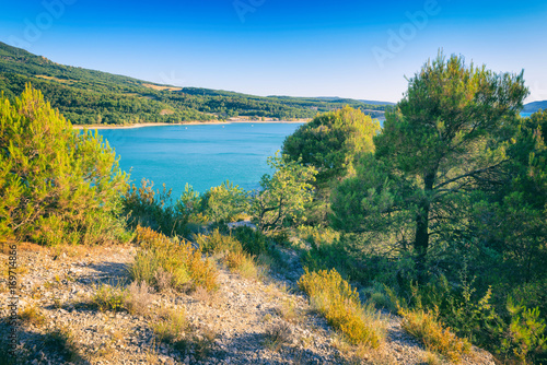 Lake Sainte-Croix, beautiful landscape in sunlight, favorite tourist destination in the Verdon gorges national park, Alpes de Haute Provence, France