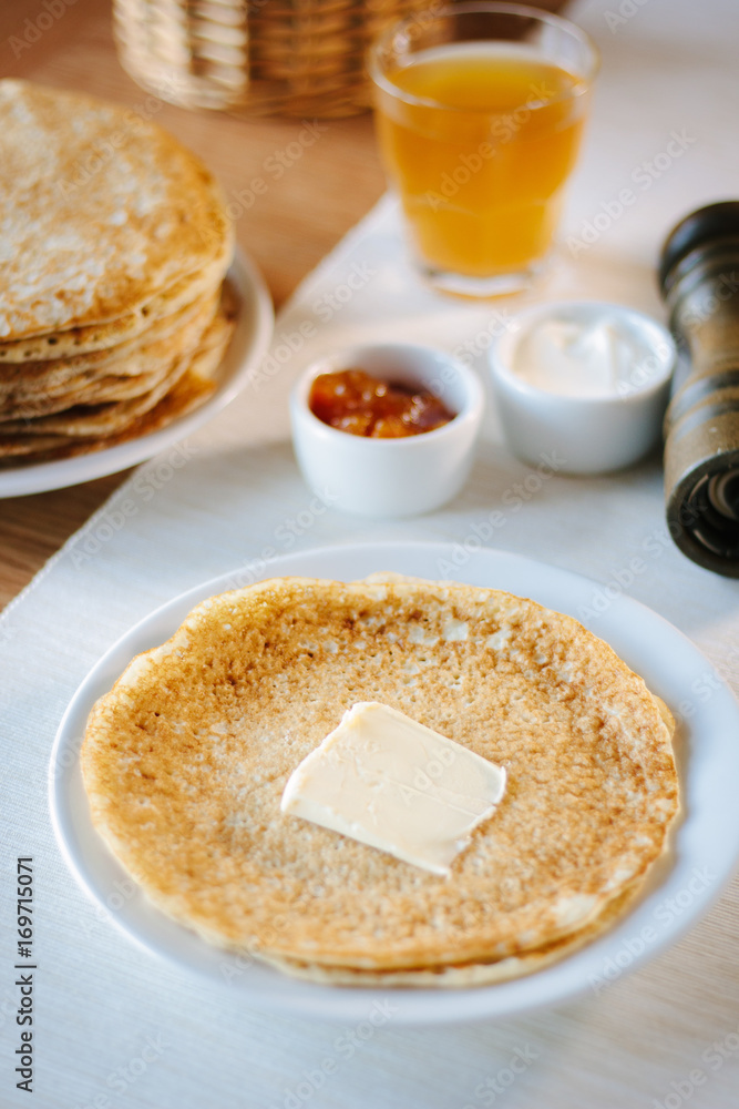 Russian pancakes with the butter on a restaurant. Russian pancakes with the butter on a restaurant.