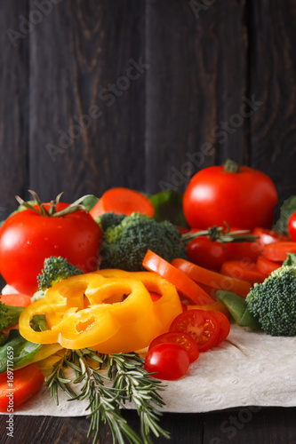 Fresh vegetables on pita bread background with copy space