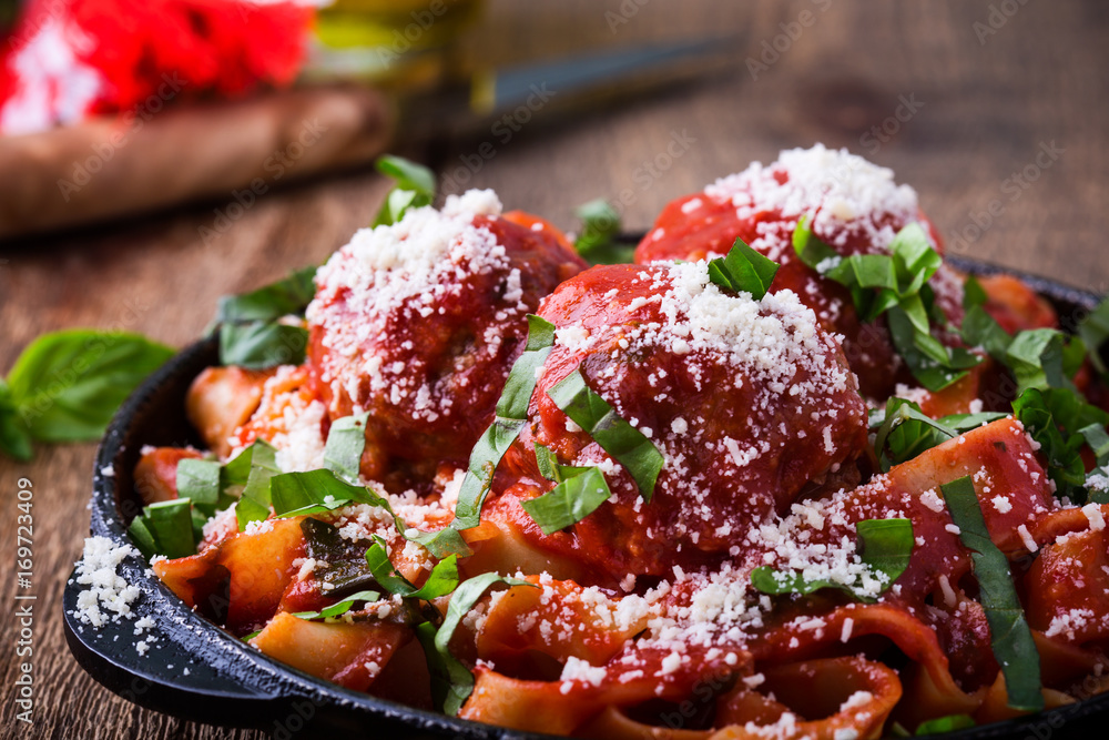 Homemade traditional Italian pasta pappardelle with meatballs Homemade traditional Italian pasta pappardelle with meatballs
