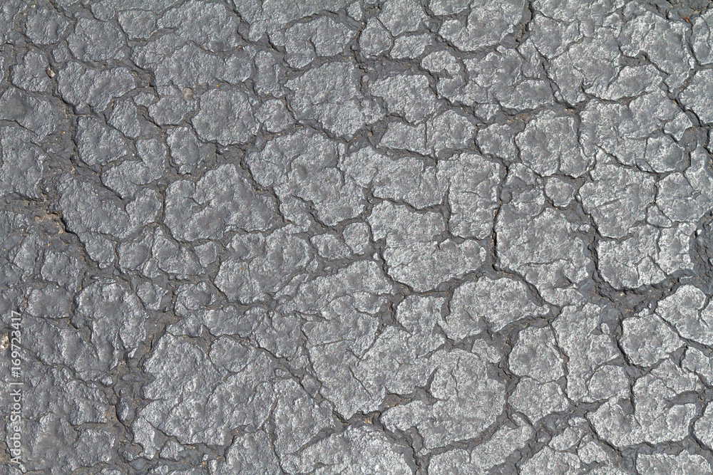 cracked dark pavement/tarmac grunge texture cracked dark pavement/tarmac grunge texture