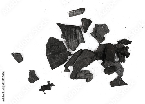 Pile charcoal isolated on white background, xylanthrax, wood coal, top view photo