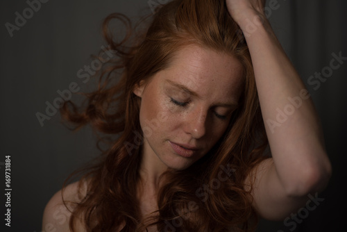 Canvas Print sensual portrait of a redheaded beautiful woman