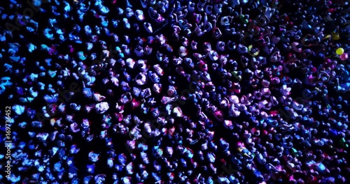  a crowd of people at a concert. drone point of view photo