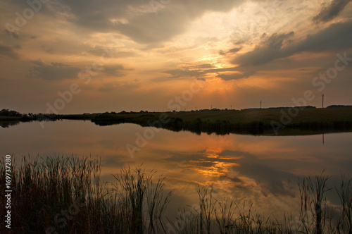 Fototapeta Naklejka Na Ścianę i Meble -  Sunset over the pond