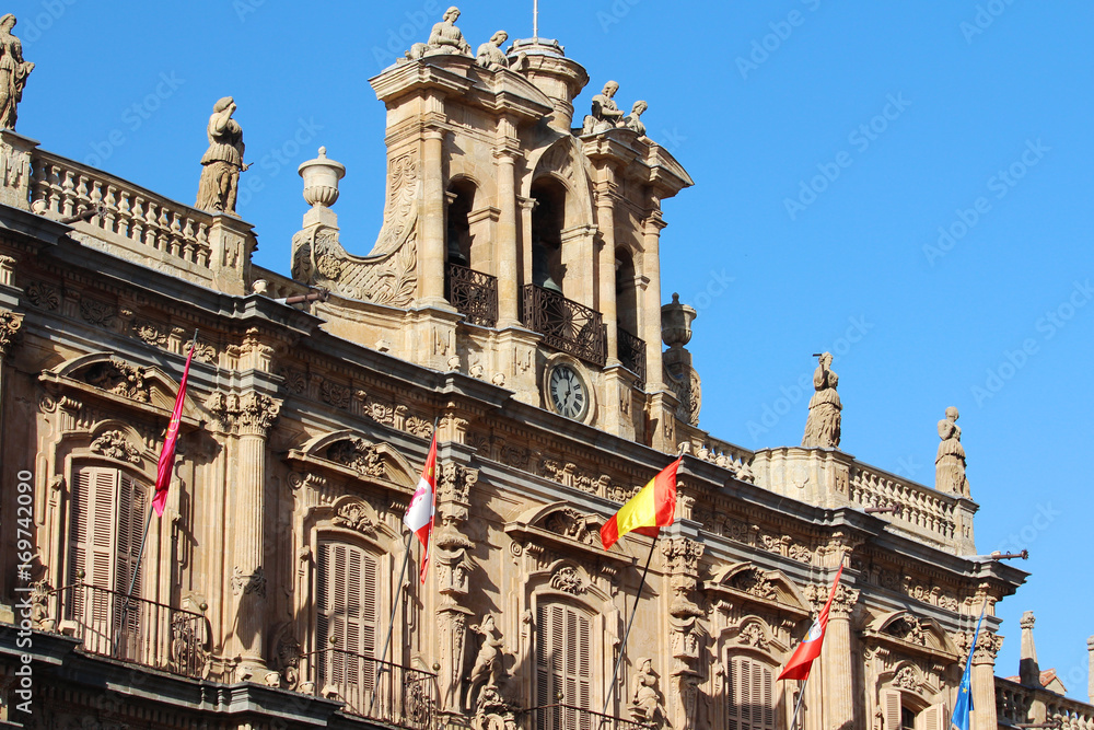 A Spanish flag at facade, The Plaza Mayor, Salamanca, Spain 
