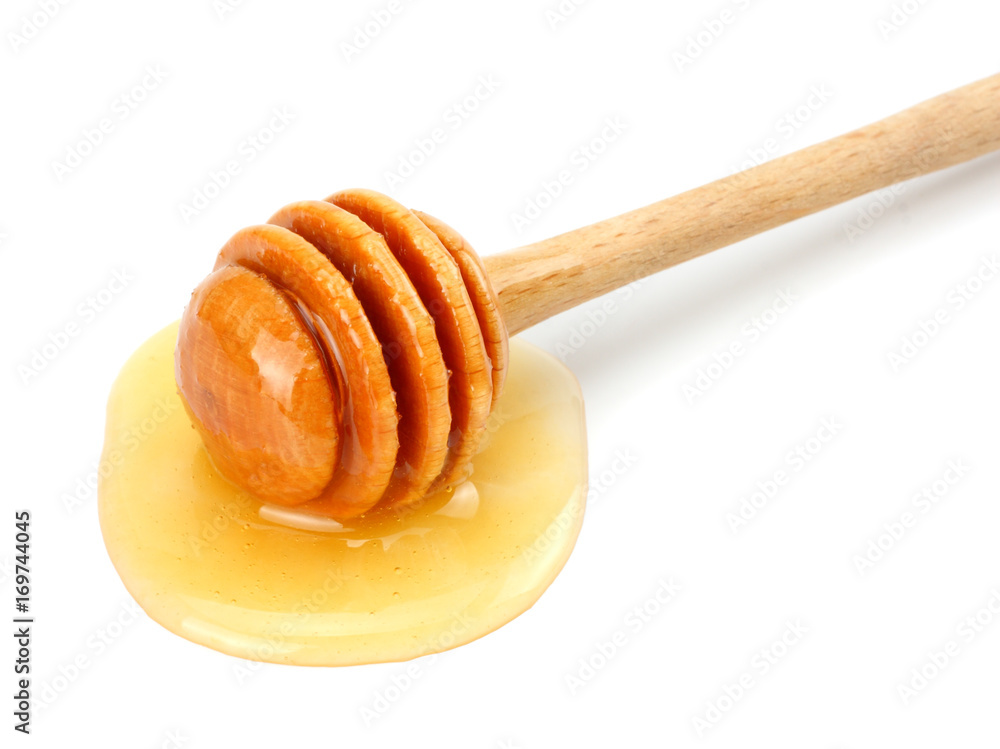 honey dipper and honey isolated on white background honey dipper and honey isolated on white background