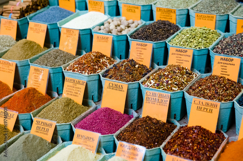 various bright spices with tag on  market