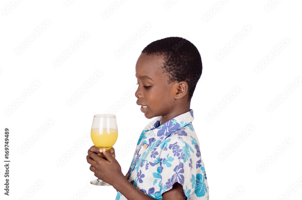 Little boy smiling drinks fruit juice. Little boy smiling drinks fruit juice.