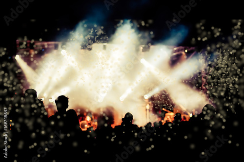 crowd with raised hands at concert - summer music festival