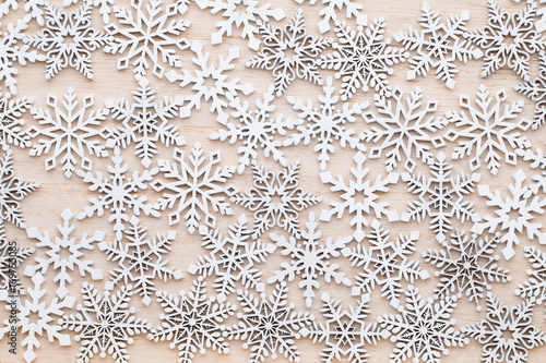 Christmas, New Year wooden decoration snowflake. © gitusik