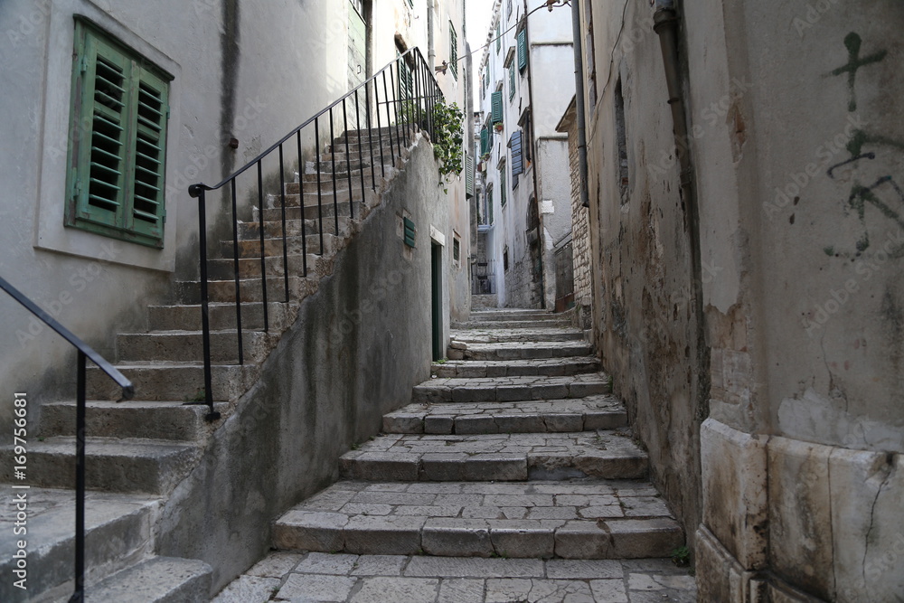 Sibenik / Tourist city by the Adratic sea - Sibenik, Croatia. The old stones, narrow street and stairs.