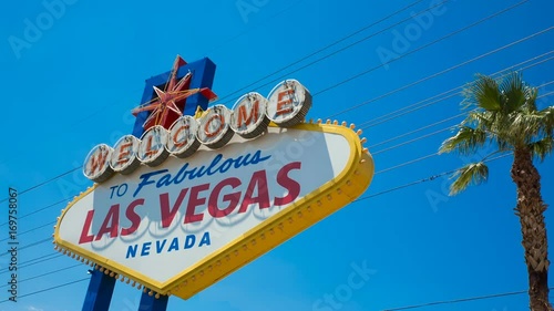 Las Vegas Welcome Sign and Palm Tree Angled Left Side. an angled view of the famous Las Vegas welcome sign
