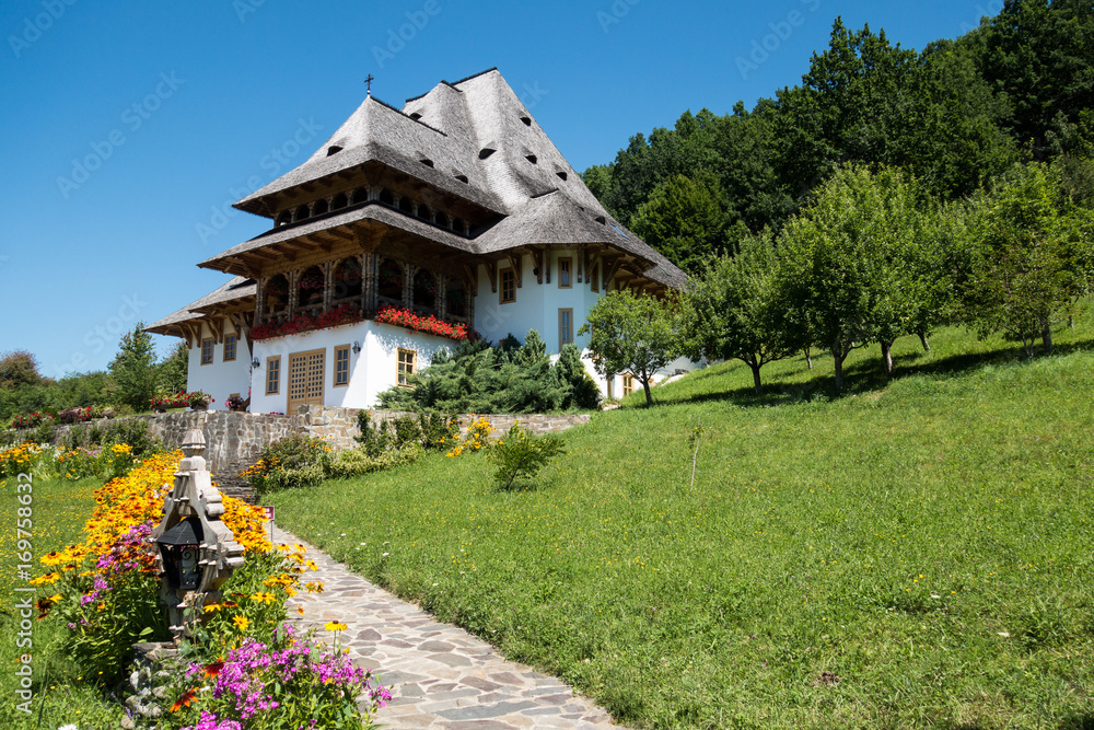 July 9th, 2017 - Barsana wooden monastery, Maramures, Romania. Barsana monastery is one of the main point of interest in Maramures area. July 9th, 2017 - Barsana wooden monastery, Maramures, Romania. Barsana monastery is one of the main point of interest in Maramures area.