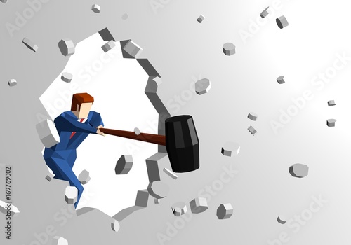 Businessman breaking wall with hammer