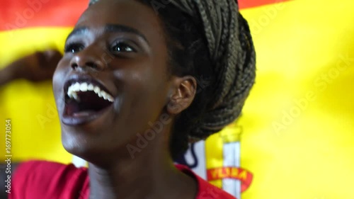 Spanish Young Black Woman Celebrating with Spain Flag