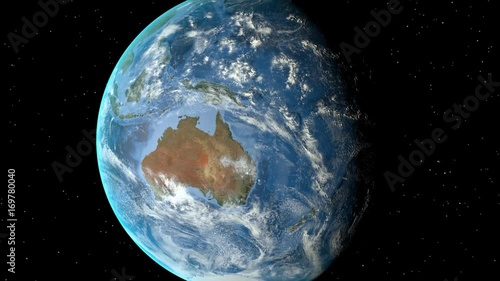 Night to day - rotating Earth. Zoom in on Australia outlined