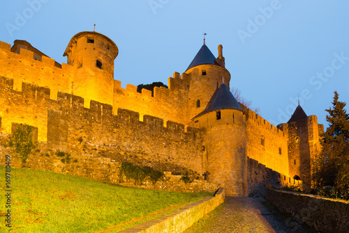  Old fortress walls in twilight time. Carcassonne