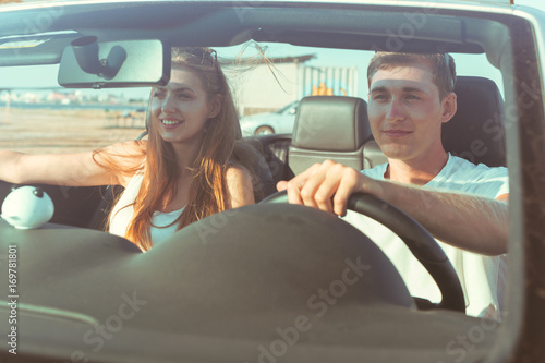 Young couple traveling by car © fotofabrika
