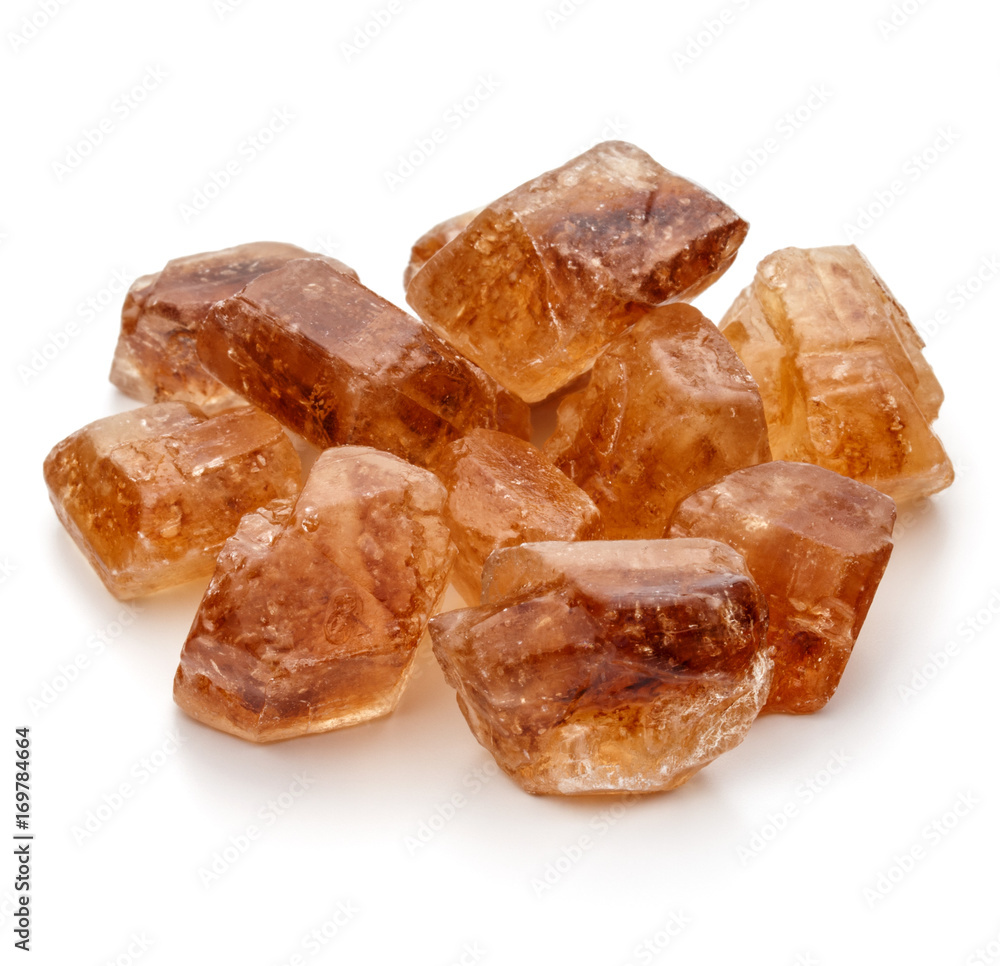 Brown caramelized lump cane sugar cube isolated on white background cutout Brown caramelized lump cane sugar cube isolated on white background cutout