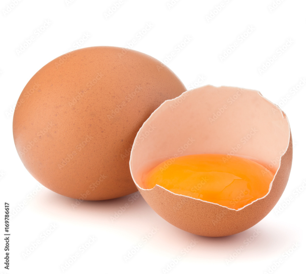 Broken egg in eggshell half and raw egg isolated on white background cutout Broken egg in eggshell half and raw egg isolated on white background cutout