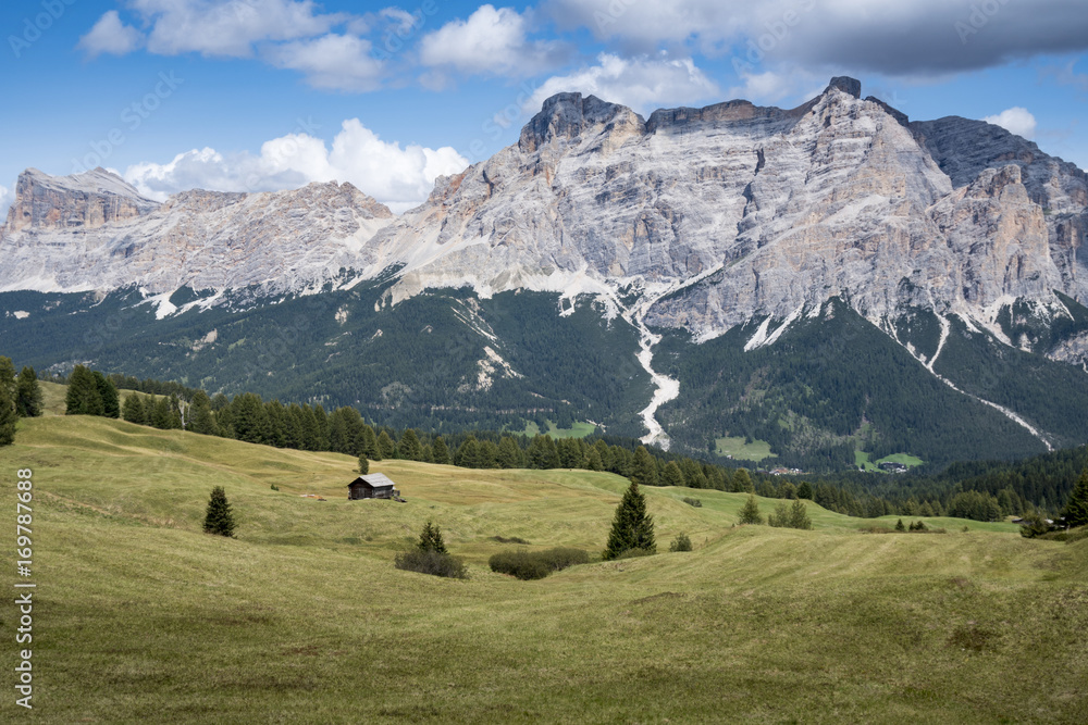 Mountain panorama with Old wooden hut