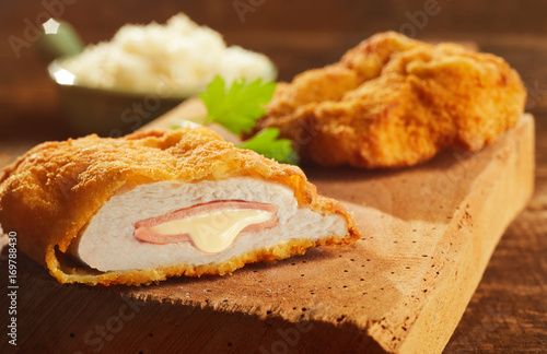 Cordon bleu pork on wooden board