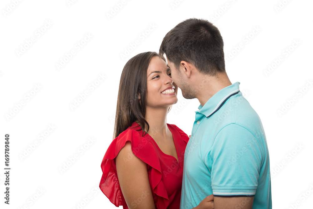 Handsome young couple embracing smiling happy Handsome young couple embracing smiling happy
