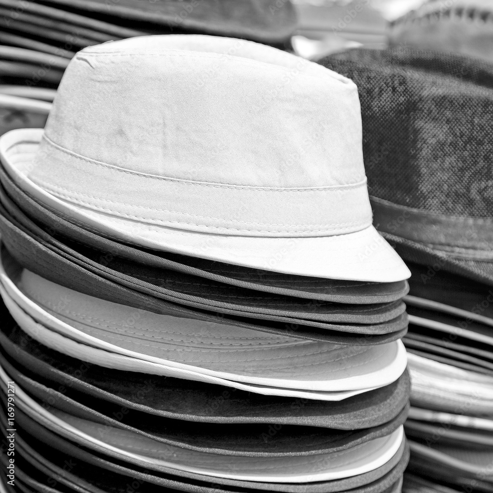 in a old market lots of colorated hats