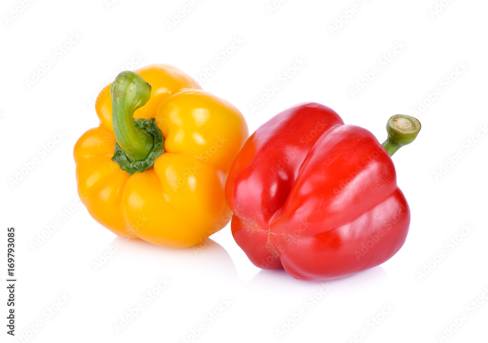 whole fresh yellow and red bell pepper with stem on white background whole fresh yellow and red bell pepper with stem on white background