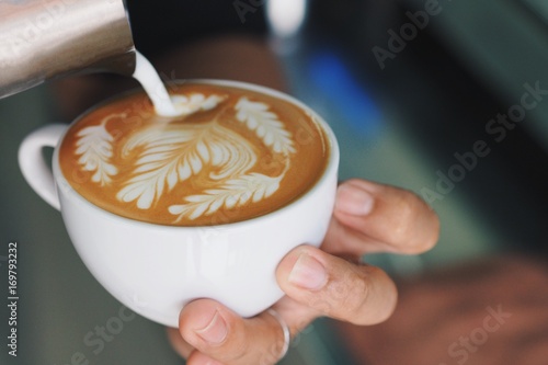 Coffee latte art making by coffee master 