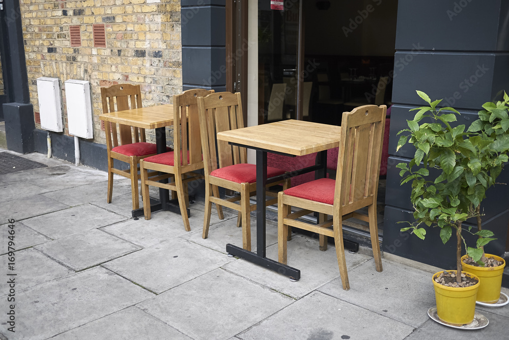 London, United Kingdom - August 23, 2017 : Restaurant table in the street of Dalston
