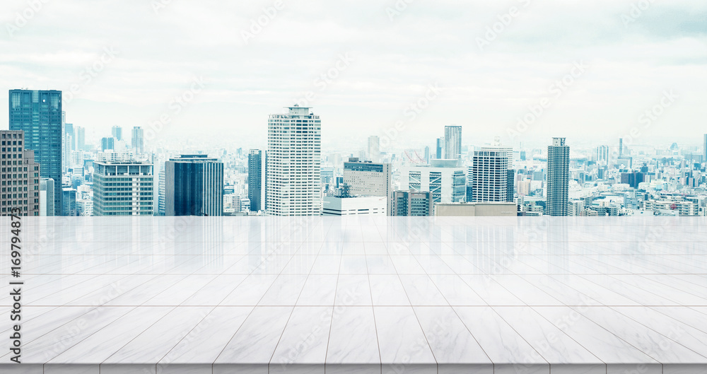 Business concept - Empty marble floor top with panoramic modern cityscape building bird eye aerial view under sunrise and morning blue bright sky of Osaka, Japan for display or montage product Business concept - Empty marble floor top with panoramic modern cityscape building bird eye aerial view under sunrise and morning blue bright sky of Osaka, Japan for display or montage product