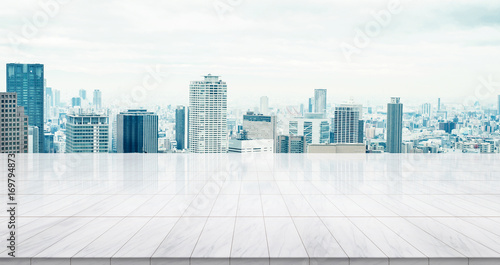 Business concept - Empty marble floor top with panoramic modern cityscape building bird eye aerial view under sunrise and morning blue bright sky of Osaka  Japan for display or montage product