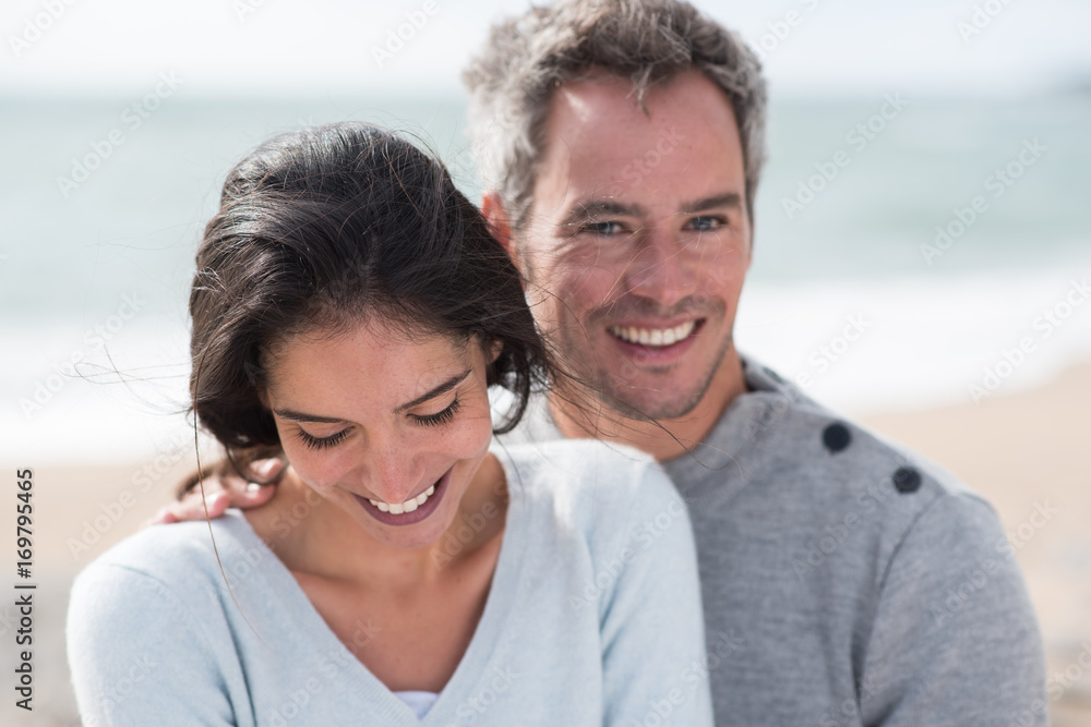 Portrait of a middle-aged couple having fun on the beach Portrait of a middle-aged couple having fun on the beach
