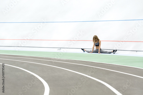 Sportive girl posing outdoors