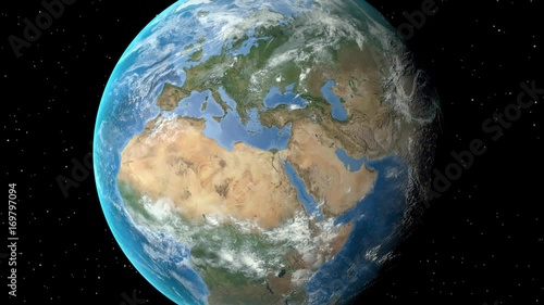 Night to day - rotating Earth. Zoom in on Italy outlined