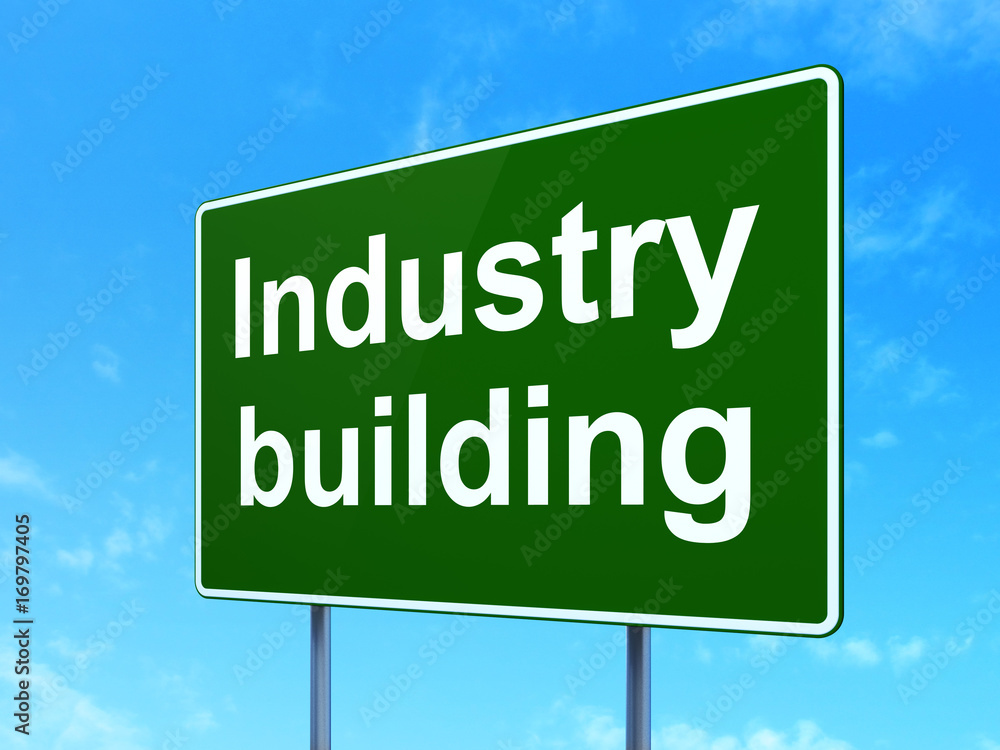 Industry concept: Industry Building on road sign background Industry concept: Industry Building on road sign background