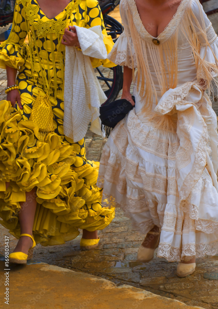 Trajes de flamenca. Feria de Abril de Sevilla / Flamenco dresses. April  Fair of Seville Stock Photo | Adobe Stock