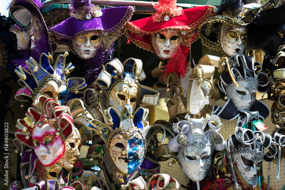 Beautiful, colorful Venetian masks on a market stall