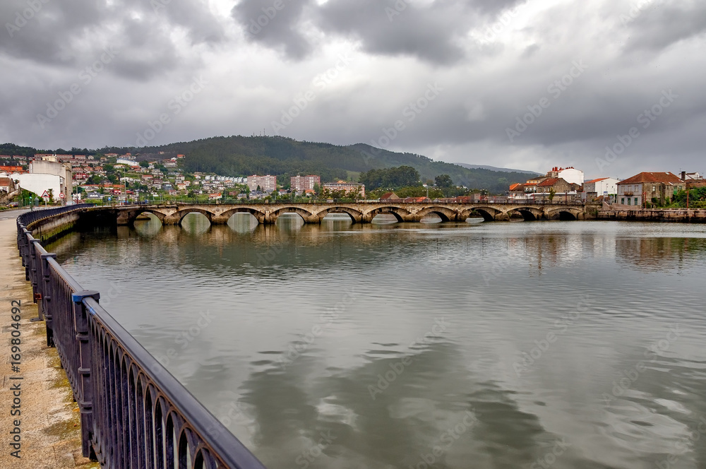 Famous Roman bridge Pontevedra, Spain over river Lerez.
