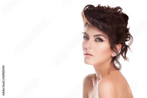 Beautiful gorgeous brunette model in studio photo isolated over white background. Perfect make up and hairstyle