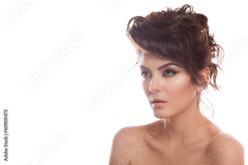 Gorgeous brunette model in studio photo isolated over white background. Perfect make up and hairstyle