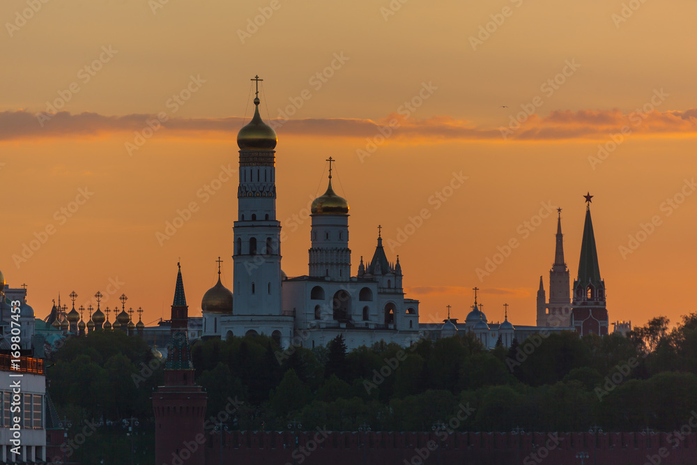 Picturesque silhouettes of the cathedrals of the Moscow Kremlin at sunset, Russia