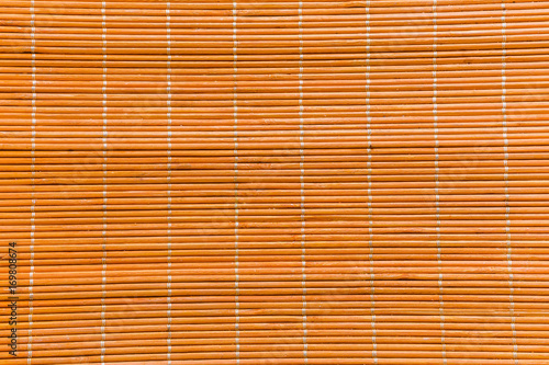 Bamboo wood orange texture with natural patterns mat texture can be used as background